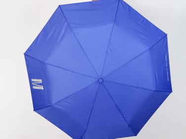 Blue folding umbrella